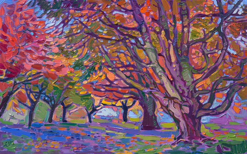 Petite oil painting of maple trees turning color in autumn.